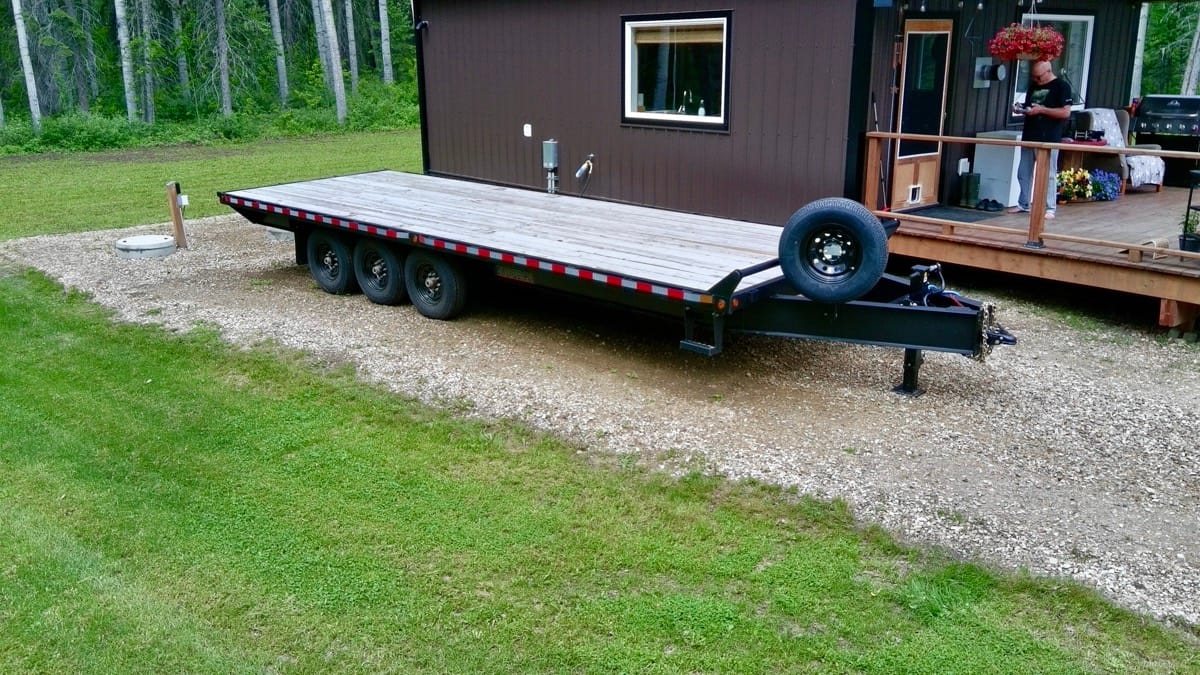 Equipment trailer loaded for local hauling and hot shot service