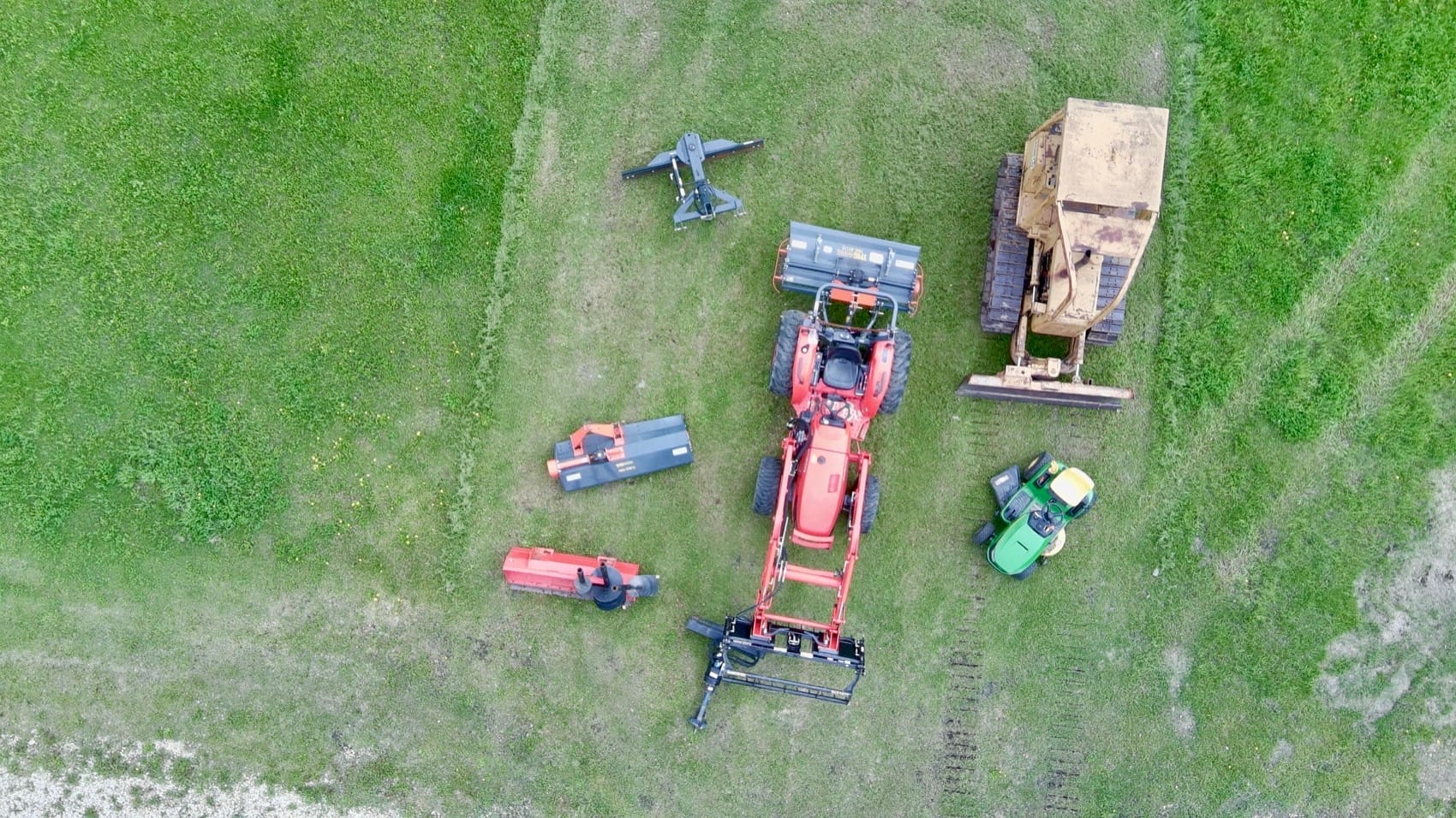 Aerial view of the Kubota tractor and Caterpillar D3B dozer